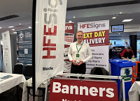 Expo stand display by HFE Signs at Derby Business Expo 2026 featuring custom safety signs, roller banners, printed signage products and promotional displays in Derby, UK.